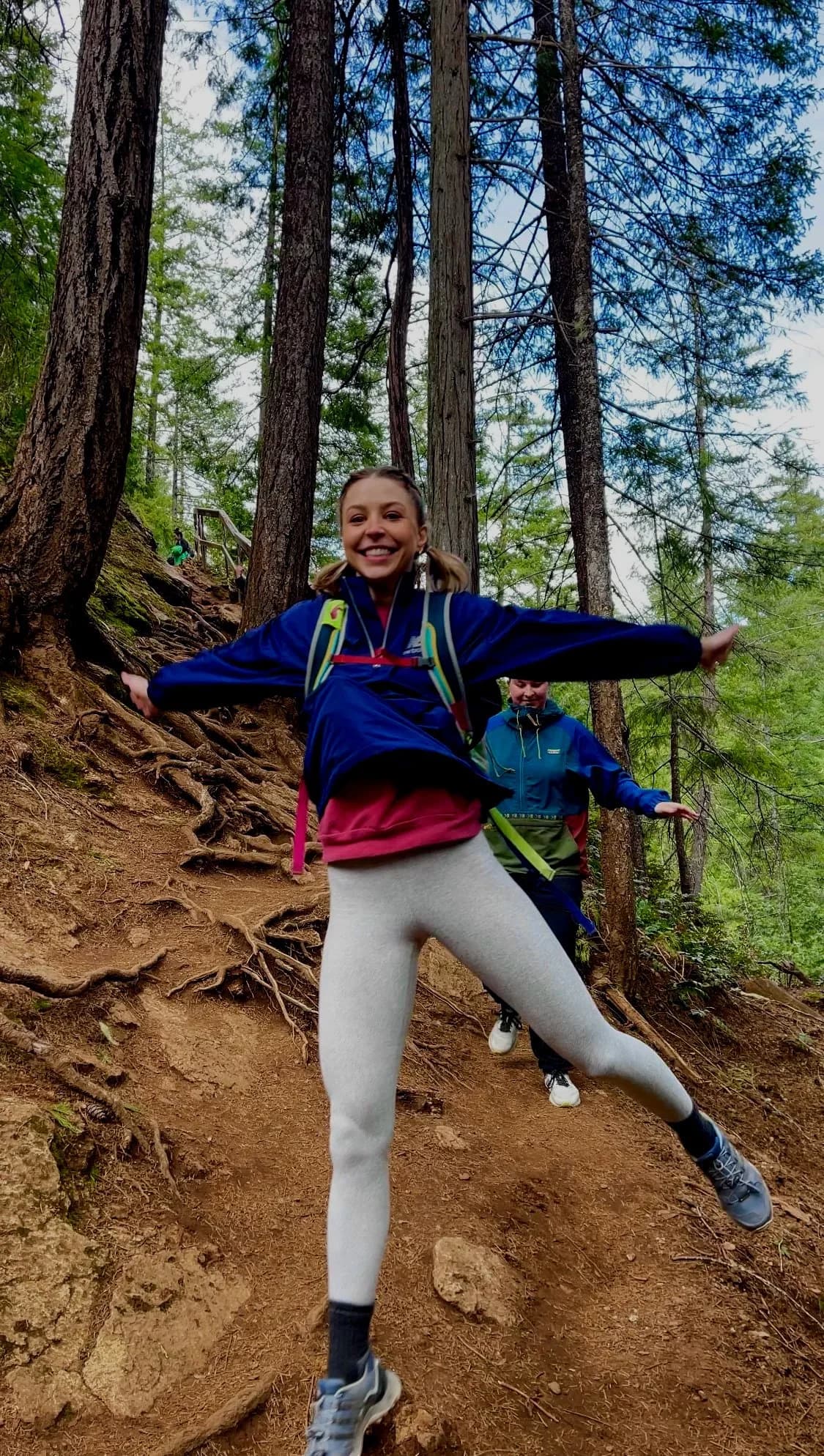 Person jumping for joy in the Umpqua National Forest